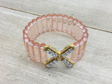 French Kande Light Rose Lucite bracelet with 24 K clad French Kiss